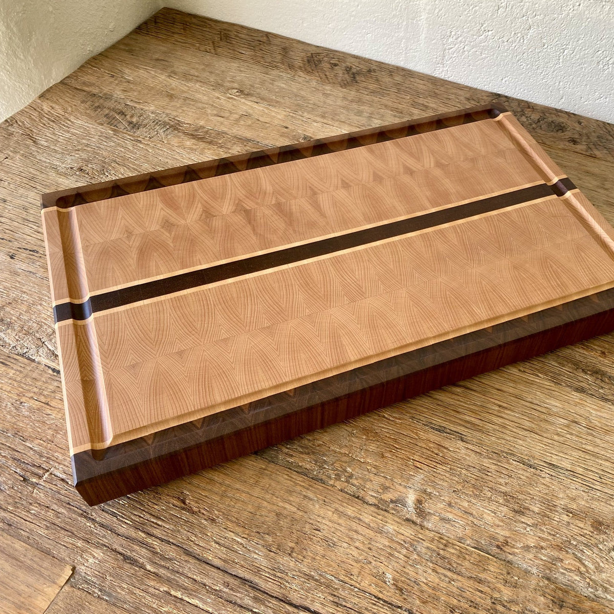 European Beech End Grain board – angled top view showing full surface and walnut border detail