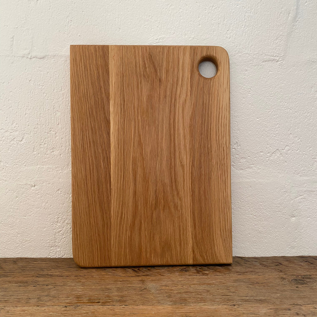 White Oak Chopper Board Large — top view on rustic timber surface